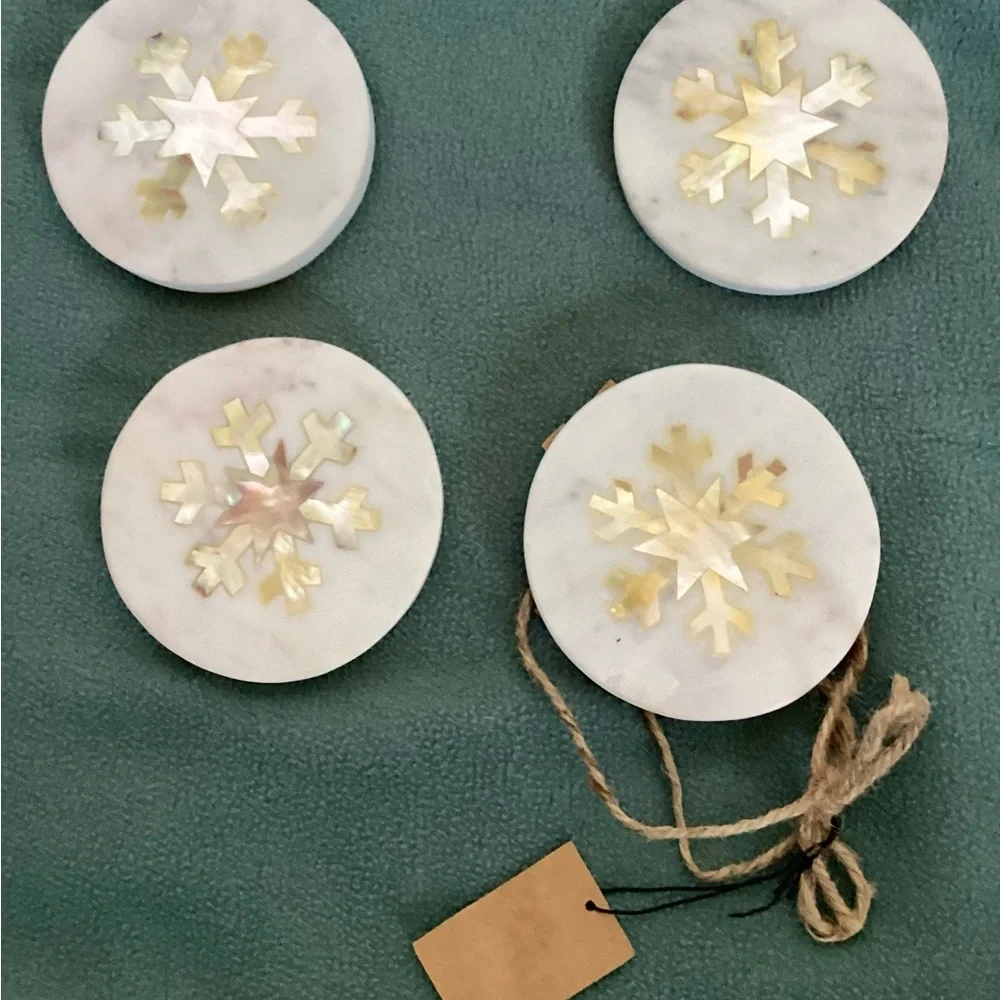 White Marble Coasters with Snowflake Design